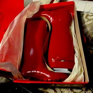 Size 11 women’s Hunter boot, new in box.  Glossy military red color.